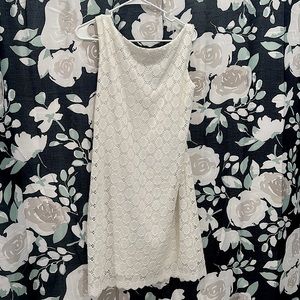 White lace like, gold zipper dress.